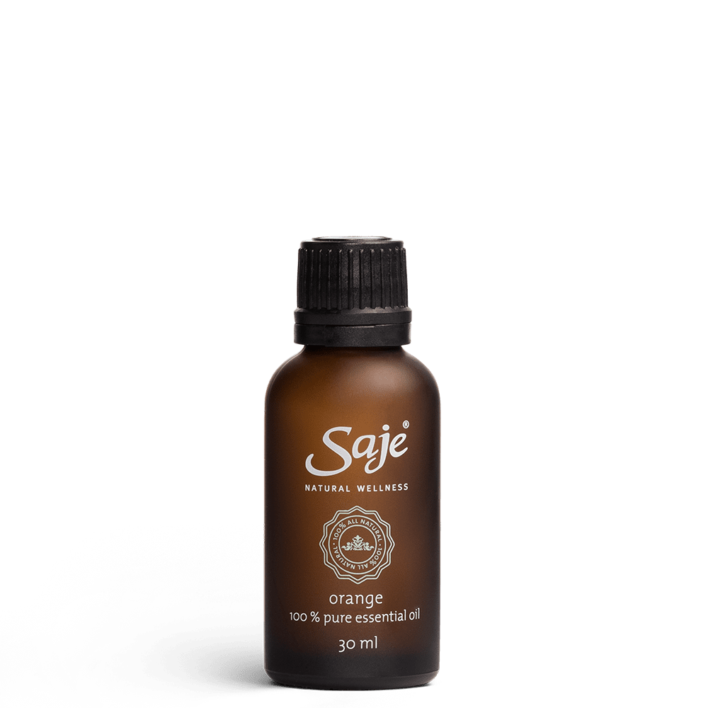 Orange pure essential oil in a 30ml brown glass bottle with the cap on