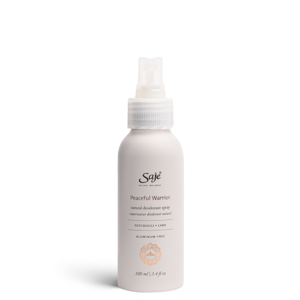 Light purple Peaceful Warrior deodorant spray bottle on white background